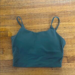 Green workout top, built in bra. Size M